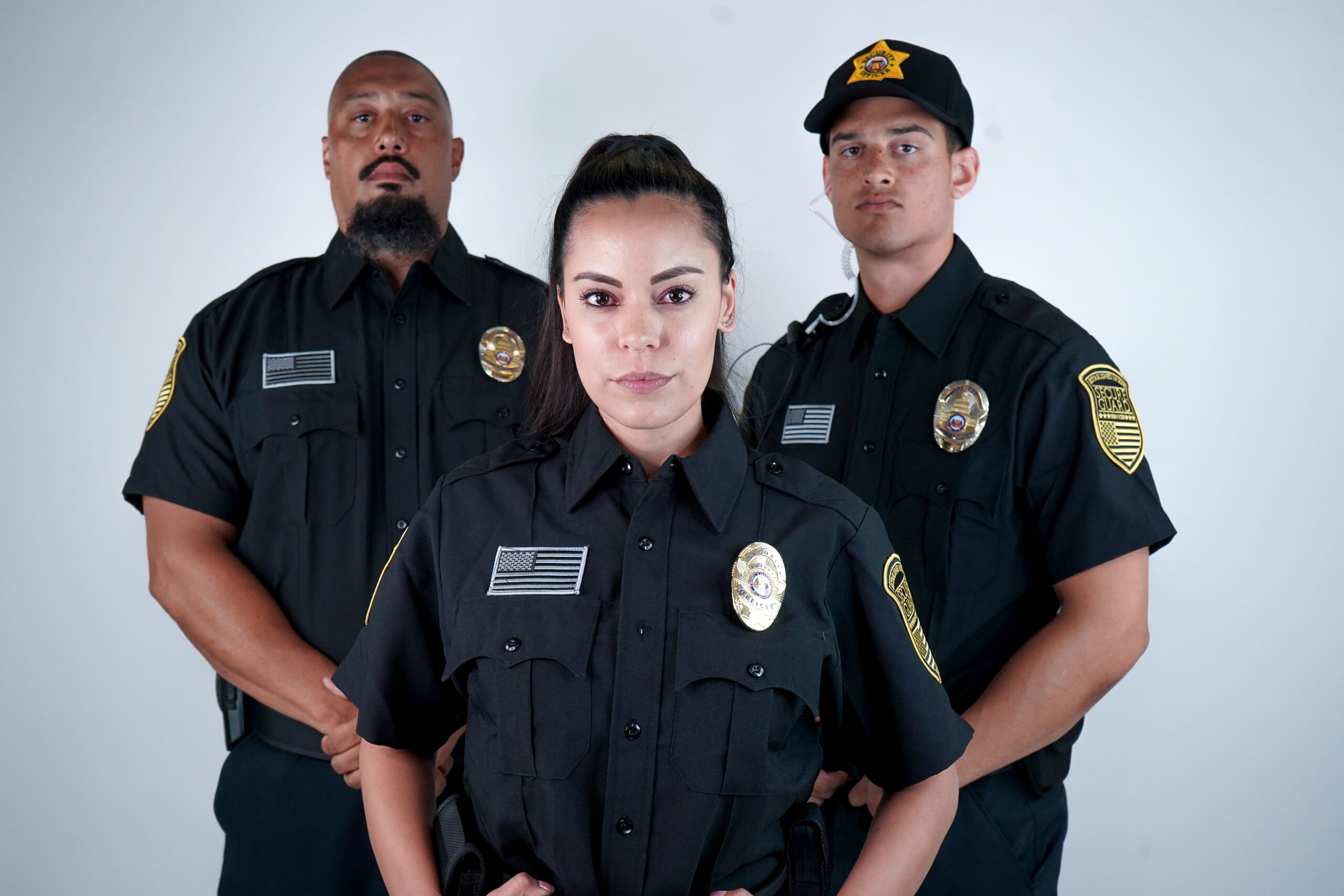 Team of unarmed security guards in uniform standing together, representing community safety and neighborhood security services in Oakland